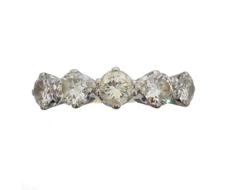 A diamond five stone ring. The brilliant cut diamond line with tapered shoulders, estimated total diamond weight 1.80cts, est