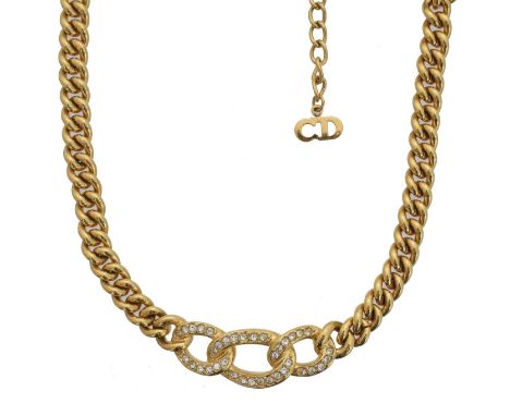 A Christian Dior paste necklace. The colourless paste set triple link with flat curb link chain sides and spring clasp with m