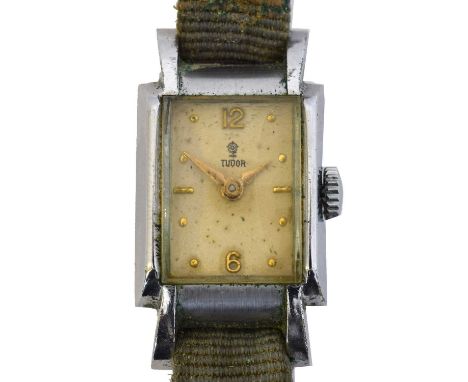 A ladies Tudor manual wind wristwatch. The signed rectangular dial with Arabic, dot and baton markers and tapered hands, sign