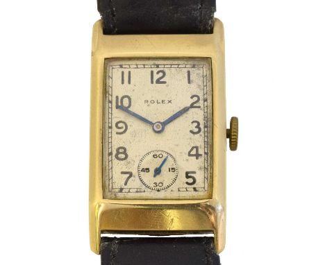 A 1930s 9ct gold Rolex manual wind wristwatch, ref. 2356. The signed rectangular dial with arabic markers, outer chapter ring