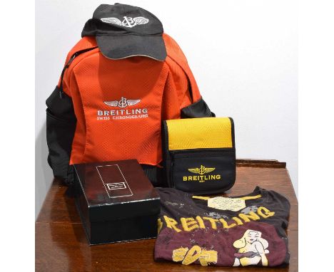 Breitling - A selection of accessories. To include a cased Breitling for Bentley watch display stand, a Breitling rucksack, a