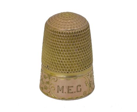 An early 20th century 9ct gold thimble by Charles Horner. With monogrammed cartouche to front, hallmarks for Charles Horner, 