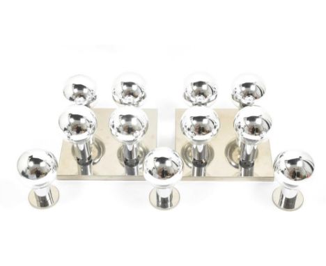for Staff Leuchten, 1970s. Consisting of two square chrome plates measuring 31 x 31 cm, each w. 4 glass lamps w. chrome tubes
