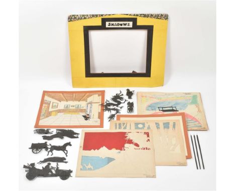 Apeldoorn, A.M.E. Overdijkink, 1919. Cardboard theatre "stage" (wooden backing broken) w. 5 different backgrounds, num. shado