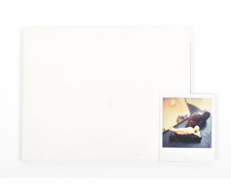 11 x 9 cm. Colour picture depicting a table top scene with a reclining woman figurine and a mirror. Signed on verso ‘for Dori