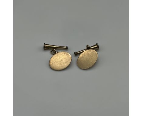 A pair of 9ct yellow gold solid handcrafted with horse hunt bugle, 7 grams in weight approx, 17mm x 12mm