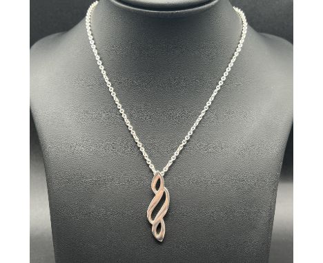 A silver necklace, Newbridge silverwear, 18 inch long chain, pendant is 40m long x 10mm wide, nice condition