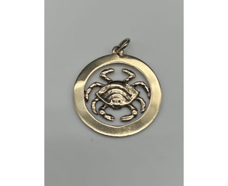 A 9ct yellow gold crab pendant,
24mm in size,
2.4 grams in weight approx,
no chain,