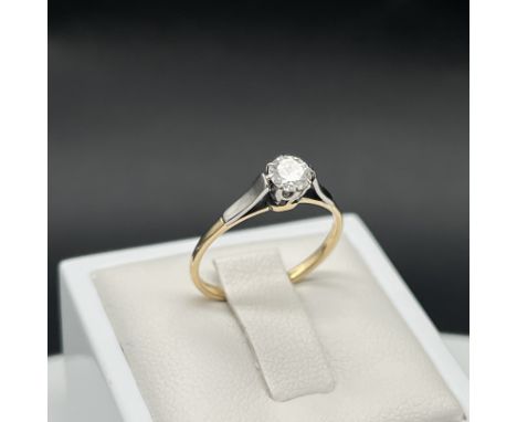 A 9ct yellow gold and platinum diamond solitiaire ring, 1.8 grams in weight approx, diamond is approx 0.40ct, size L, very ni