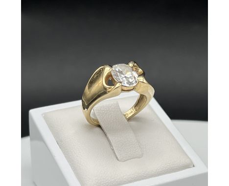 A 14ct yellow gold stone set dress ring,
size L,
4.8 grams in weight approx,
set with a cz stone