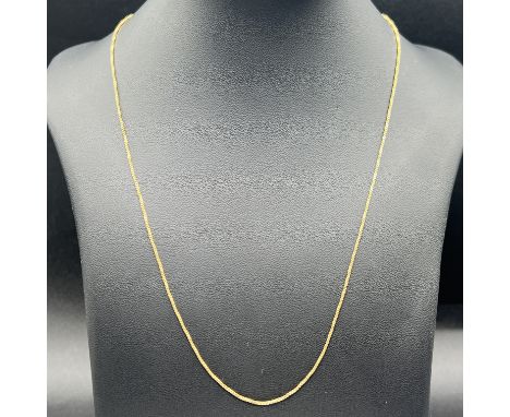 An 18ct yellow gold box chain, 24 inches long, very nice condition, hallmarked, 4.1 grams in weight approx