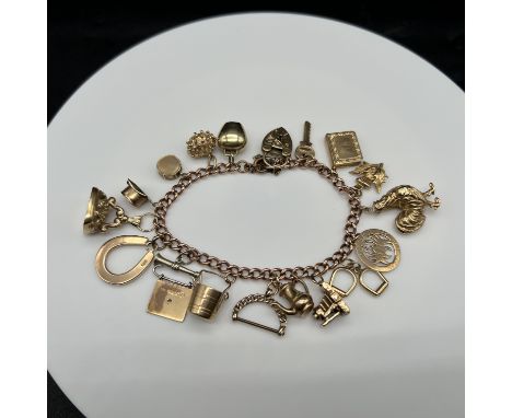A 9ct yellow gold vintage charm bracelet,
all charms are hallmarked,
17 charms + heart locket,
42.5 grams in weight approx,