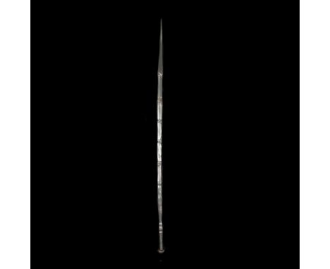 An Indian all iron javelin. Probably 18th or 19th century, 94cms overall, substantial diamond-section tapered head, haft divi
