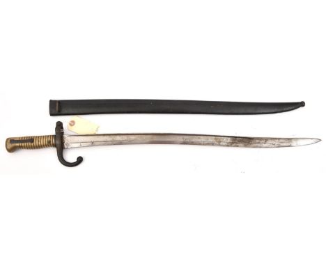 A Chassepot bayonet,  marked "Mfre d'Armes de St Etienne Aout 1873" on backstrap, in its black painted steel scabbard. GC    