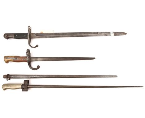 A French M1886/93/16 Lebel bayonet, in its scabbard (slightly pitted); a Turkish Mauser bayonet (worn and pitted); and a cut 