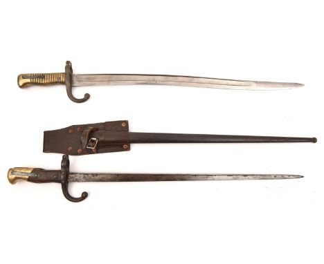 A Chassepot bayonet, marked "Mre Imp/ale de Mutzig Aout 1868" (no scabbard) and a Gras bayonet marked "St Etienne Xbr 1875", 