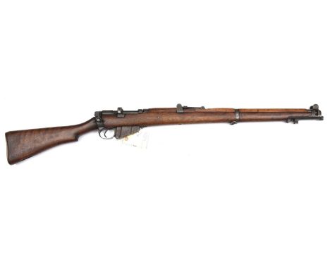 A de-activated .303" SMLE No 1 Mk III* bolt action military rifle, number 64596Y, the receiver and muzzle mount engraved with