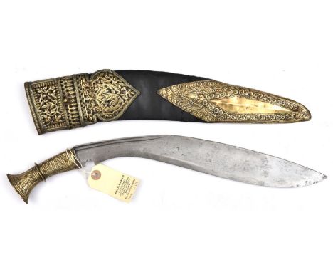 A kukri, blade 14", with short twin back fuller, sheet brass covered hilt embossed with stylized foliate and geometric panels