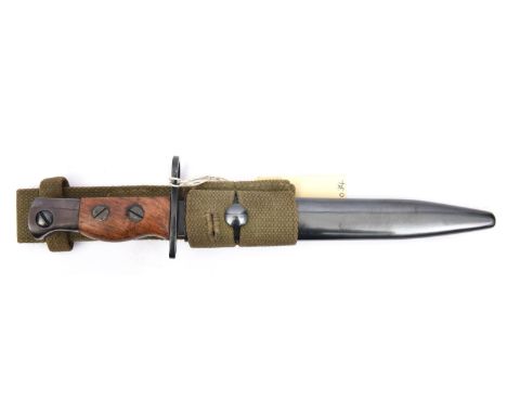 A No 5 Mk II jungle carbine bayonet,  fullered blade marked R.F.1 at forte, wood grips secured by 2 screws, in scabbard with 