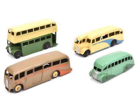 4 Dinky Toys buses. 29b, Streamlined bus in two-tone green. 29c, Double Decker bus in cream and green with AEC radiator. 29e,