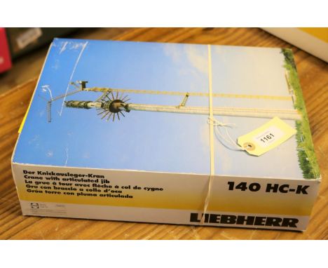 A Liebherr 1:87 scale diecast model Crane with articulated jib (140 HC-K). A highly detailed construction model of a static c