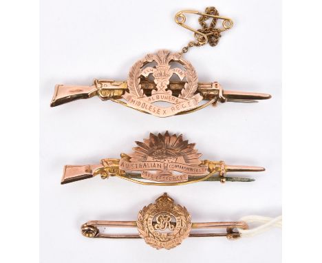 2 9ct gold sweetheart tie pins: badge on rifle Middlesex Regt with safety chain, and "Australian Commonwealth Military Forces