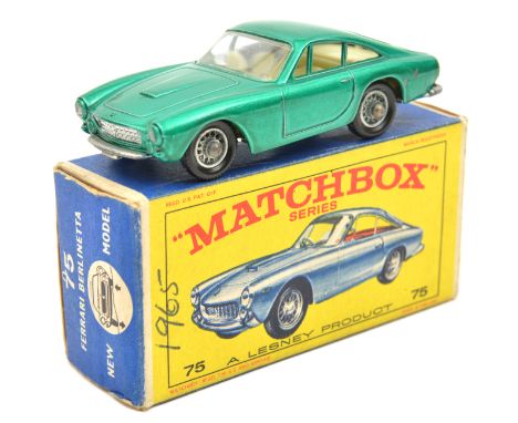 A Matchbox Series Ferrari Berlinetta (75b). In metallic green with wire wheels and a silver base. Boxed, minor wear. Vehicle 