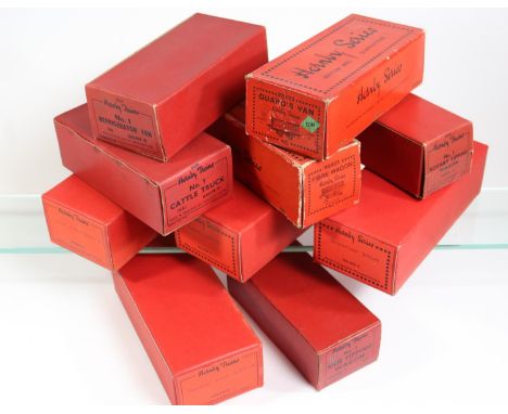 10x Hornby O gauge freight wagons. Including; Refrigerator van, Side tipping wagon, Double wine wagon, Low-sided wagon, Guard