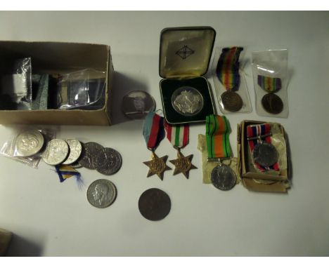 Four:  1939-45 star, Italy star, Defence, War (un-named as issued) in carton, EF. WWI Victory medal (2: 2882 A.2. Cpl T Newma