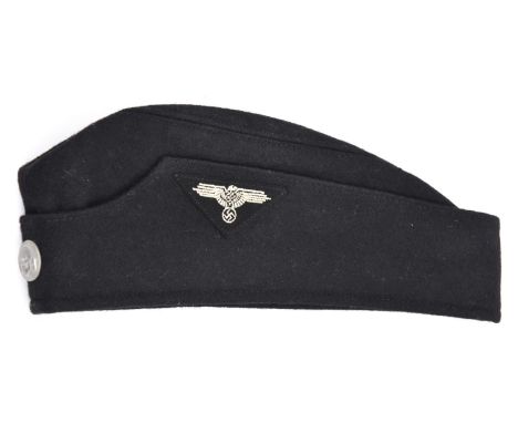 A scarce original Third Reich SS man's sidecap,  with small embroidered eagle badge and WM button to the front, the lining wi