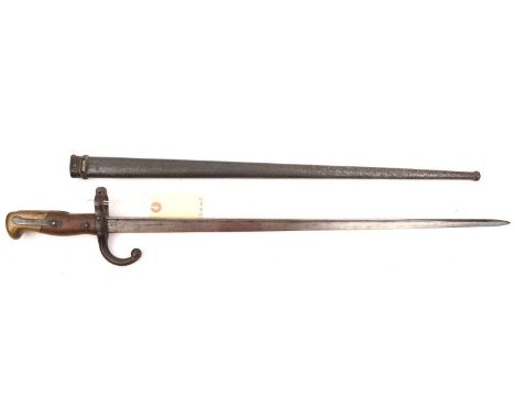 A French M1874 Gras bayonet, d 1878 on backstrap, in scabbard. GC                                                 £50-60 