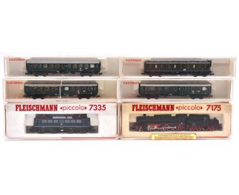 6x N gauge model railway Deutsche Bahn items by Fleischmann. Including a Class 050 2-10-0 tender locomotive, 050 0587, in red