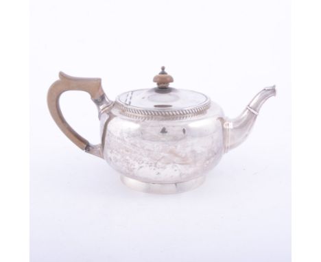 Circular silver teapot, Edwards & Sons, Birmingham 1922, compressed form, gadrooned collar, fruitwood handle and finial, 18oz