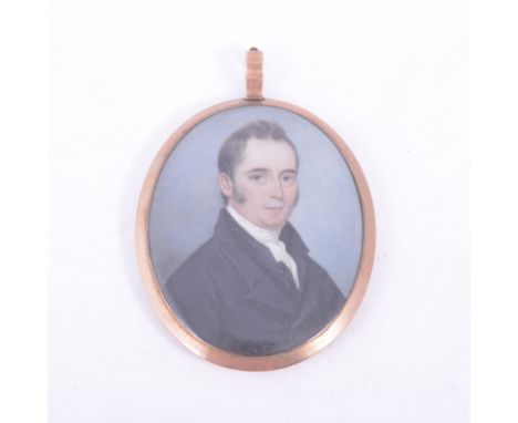 English School, 19th Century,head and shoulders miniature portrait of a man wearing a black coat,oval 61x48mm, gilt metal fra