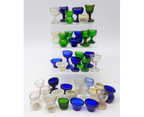 Collection of various glass and ceramic eye baths including some glass marked Optrex Safeguards Sight  Condition Report Click