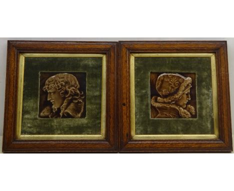 Pair late 19th century relief moulded portrait tiles, decorated with a young man and woman in profile, probably by J&W Wade &