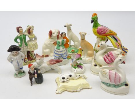 Two Victorian Staffordshire Swan moulded pen holders and another in the form of a Parrot, H14.5cm two Staffordshire seated Gr