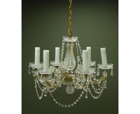 Six light chandelier, central glass column supporting six scroll branches, adorned with glass flower heads and prism drops, D