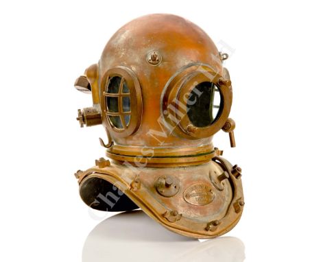 of typical form with front weight studs, spit cock, numbered face plate, air inlet, spring return valve telephone port, exhau