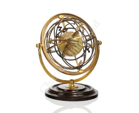 constructed in lacquered and oxidised brass and comprising a 6in. terrestrial globe published by J. Wyld mounted on rotating 