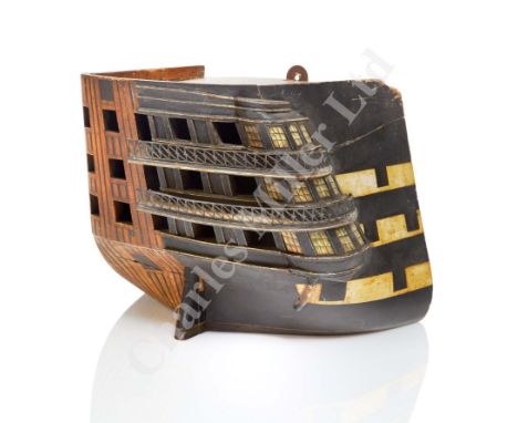 carved and hollowed from the solid with deck and back board, finished in polychrome, the port side revealing the frames and s