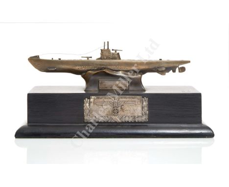 cast in base metal, possibly German silver, the conning tower engraved 'U192' with snorkel and periscope, deck guns, gratings