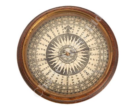 with 4¾in. etched compass card signed Made by G. Adams in Fleet Street, London, ebonised steel needle and mounted in glazed w