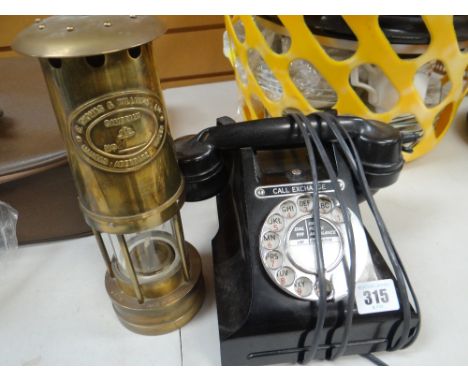 A VINTAGE BLACK TWO-PIECE TELEPHONE, together with a Thomas &amp; Williams Aberdare miner's lamp
