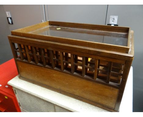AN UNUSUAL GALLERIED COFFEE TABLE constructed from a salvaged copper planter and with glass top and sides