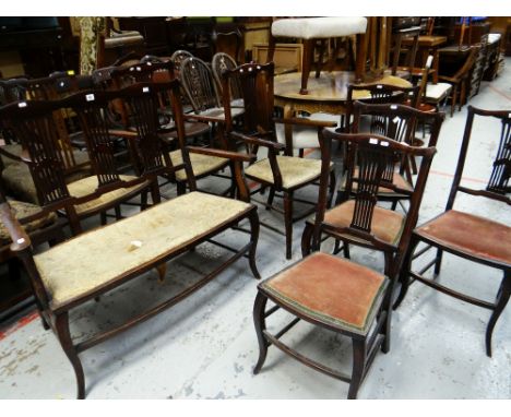 AN EDWARDIAN MAHOGANY BOUDOIR SUITE comprising small sofa, two armchairs and four other chairs with a decorative fretwork fla