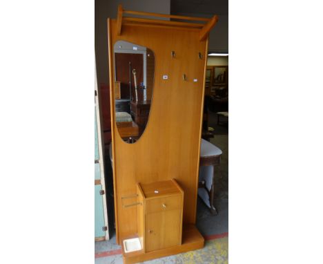 A VINTAGE LIGHT WOOD MIRRORED HALL STAND with drawer and cupboard base