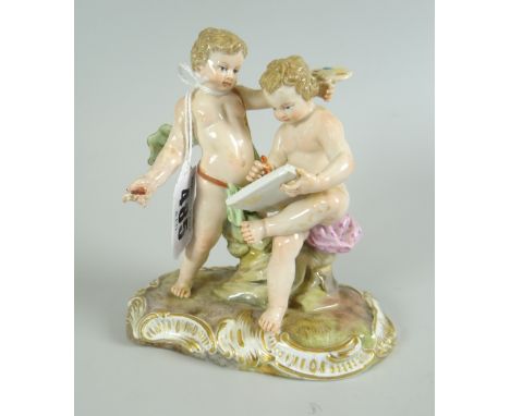 A MEISSEN PORCELAIN GROUP of two scholarly putti, 12cms highOne of the pencils has broken off and is missing. Note: this lot 