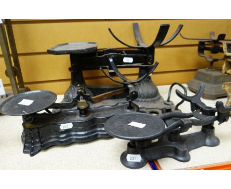 THREE VINTAGE CAST METAL WEIGHING SCALES