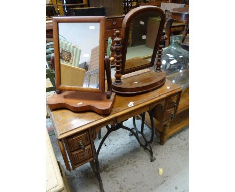A VINTAGE METAL SEWING MACHINE BASE, together with two small toilet mirrors